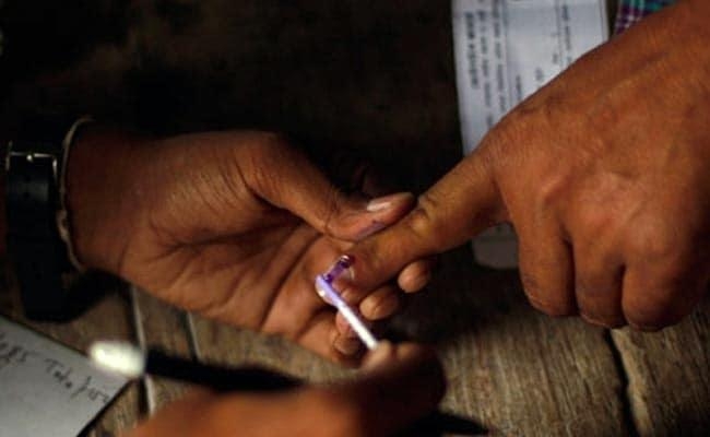 “कमल पर बटन दबाकर लें बदला”