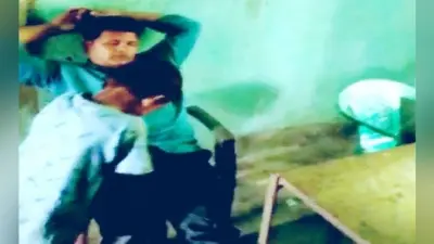 पढ़ाने के बजाय बच्चे से मसाज कराते शिक्षक का वीडियो वायरल, शिक्षक ने आरोपों को बताया बेबुनियाद