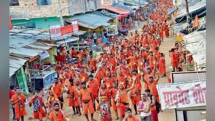 देवघर : सावन की पहली सोमवारी , कांवरिया पथ पर उमड़ा कांवरियों का सैलाब