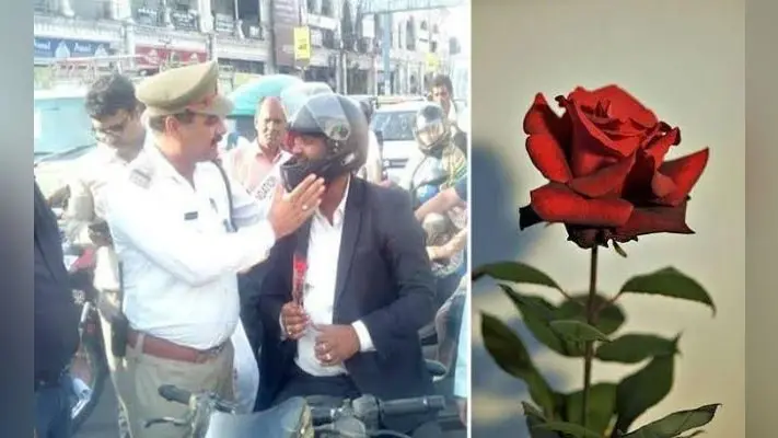 बिना हेलमेट के निकले लोगों को पुलिस ने गुलाब फूल देकर किया जागरूक