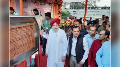 Photos : आसनसोल में 20 घंटे की मशक्कत के बाद नदी में डूबे युवक का शव निकाला गया बाहर