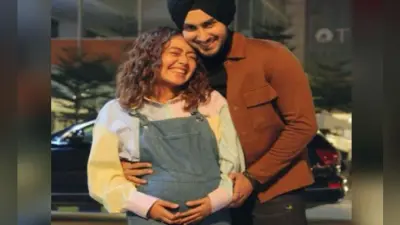 Neha Kakkar Pregnant : प्रेग्नेंट हैं नेहा कक्कड़, बेबी बंप फ्लॉन्ट करते हुए पति संग शेयर की ये खूबसूरत तसवीर