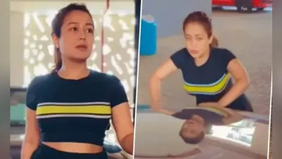 नेहा कक्कड़ ने गाड़ी के बोनट का सहारा लेकर मारे पुशअप्स, वायरल हो रहा है ये VIDEO