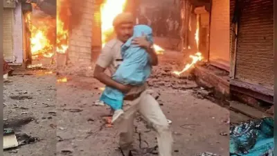 करौली हिंसा: आग में फंसे थे लोग, जान पर खेलकर कांस्टेबल ने बचाई मासूम समेत 3 की जान, हो रही वाहवाही