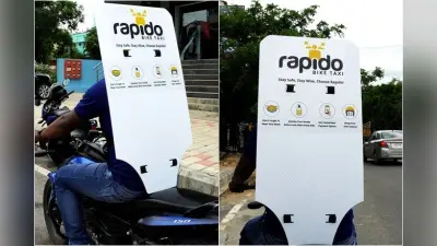 Rapido ने सोशल डिस्टेंसिंग के लिए अपनाया अनोखा तरीका, बाइक पर लगा दी बैक शील्ड