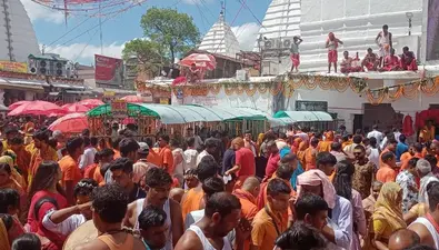Shravani Mela 2022 LIVE: सुलतानगंज से मगंलवार को लगभग 70 हजार कांवरियों ने उठाया जल, देखें तस्वीरें