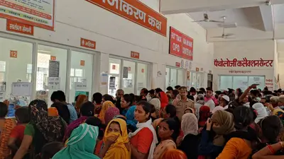 आगरा: SN मेडिकल कॉलेज में पर्ची कटाने के लिए झेलनी पड़ रही दुश्वारी, गर्मी में धक्का-मुक्की से बेहाल हुए मरीज