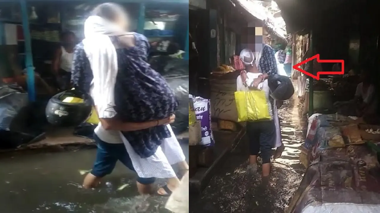 भागलपुर में बीच बाजार पत्नी को गोद में उठाकर ले जाने की मजबूरी, बारिश खोलती है स्मार्ट सिटी की पोल; PHOTO
