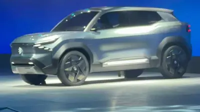 Hyundai Kona Electric को डाउन करने आ रही Maruti नई EV कार, चार्जिंग के दौरान की गई स्पाई