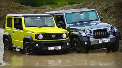 Mahindra Thar vs Maruti Jimny: ग्राउंड क्लीयरेंस और फ्यूल कैपेसिटी में कौन है बेहतर?