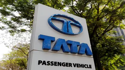 तिमाही नतीजों में टाटा मोटर्स मजबूत, शेयर बाजार में टूटा शेयर