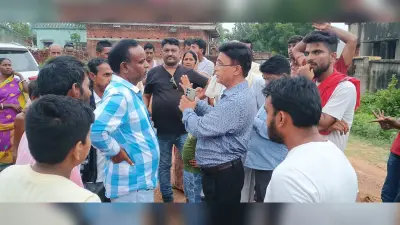 गोविंदपुर अंचल : अवैध कागजात पर बड़े भूखंड पर घेराबंदी, ग्रामीणों ने रोका काम, सीआइ से नोकझोंक