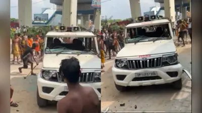 Kanwar Yatra: कावंड़ियों ने गाजियाबाद में पुलिस की गाड़ी तोड़ी, बदायूं में हादसे के दौरान दो की मौत