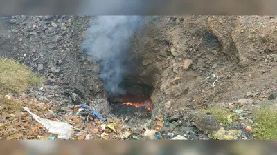 dhanbad news जोगता की खाली जमीन से आग निकलने से मची अफरातफरी