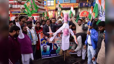 Deoghar News : कांग्रेस व राजद नेताओं ने केंद्रीय गृह मंत्री का पुतला फूंका