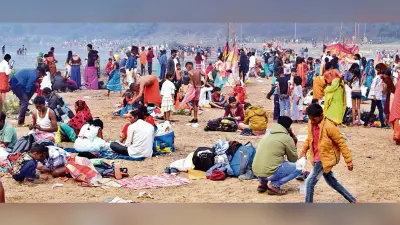 Dhanbad News: मकर संक्रांति पर लोगों ने लगायी आस्था की डुबकी