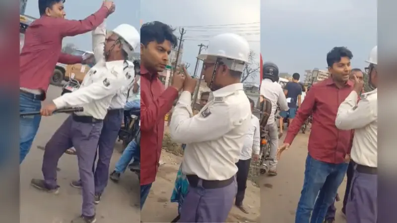 Viral Video: नियम समझाने पर ट्रैफिक पुलिस की कर दी पिटाई, हाथ भी मरोड़ा, देखें वीडियो