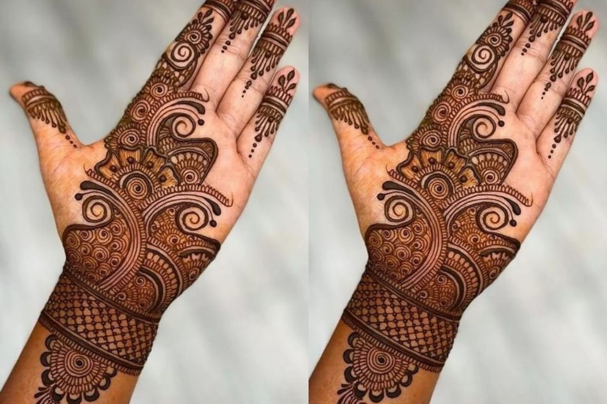 Full hand mehndi with floral motifs for Vat Savitri vrat celebrations
