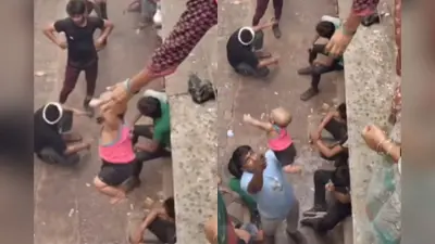 OMG, महिला ने छत से फेंक दिया बच्चा, फिर जो हुआ देख कांप जाएगी रूह, देखिए Viral Video