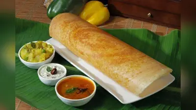 Paper Dosa Recipe: घर पर बनाएं क्रिस्पी साउथ इंडियन पेपर डोसा – पेट भर जाएगा फिर भी मन नहीं मानेगा