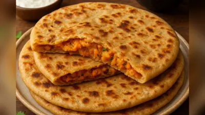 Aloo Gajar Paratha: सर्दियों में नाश्ते में तैयार करें फ्लेवरफुल आलू-गाजर पराठा, जानिए आसान रेसिपी