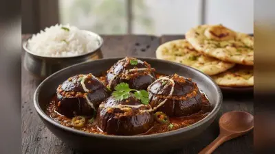 Achari Bharwa Baigan: चटपटा खाने का कर रहा है दिल को झटपट बना लें अचारी भरवा बैंगन