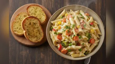 Cheesy Vegetable Pasta Recipe: बच्चों को खिलानी है हरी सब्जियां? इस तरह बनाएं चीजी वेजिटेबल पास्ता, मिनटों में चट कर जाएंगे पूरा टिफिन