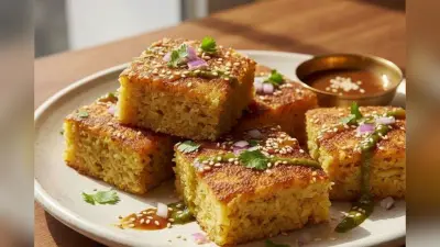 Poha Dhokla Recipe: सुबह की जल्दबाजी में फटाफट बना लें गुजरात स्पेशल पोहा ढोकला, नोट कर लें सिंपल रेसिपी