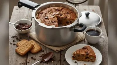 Biscuit Cooker Cake Recipe: घर पर कुकर में ऐसे बनाएं सॉफ्ट बिस्किट केक, स्वाद होगा बेमिसाल