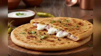 Onion Cheese Paratha Recipe: ब्रेकफास्ट में बनाएं स्वाद से भरपूर प्याज चीज पराठा, बहुत आसान है रेसिपी