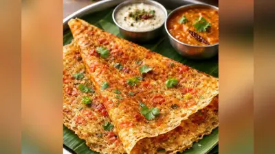 Tomato Rava Dosa: कम समय में घरवालों के लिए तैयार करें ये टेस्टी टमाटर रवा डोसा