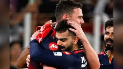 IPL 2026: RCB को चैंपियन बनाने वाला गेंदबाज भारत पहुंचा, शुरुआती मैचों में खेलने पर सस्पेंस
