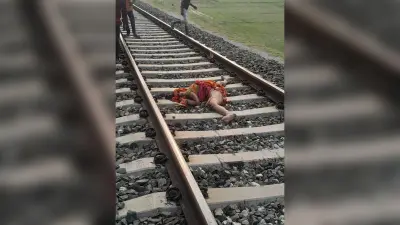 महिला ने ट्रेन के सामने कूद कर की आत्महत्या
