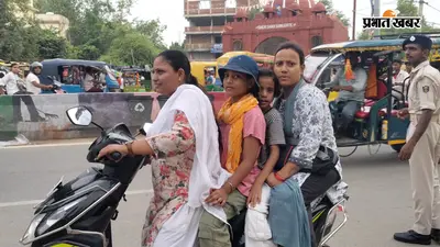 इलेक्ट्रिक स्कूटी बनी ‘जनरल बोगी’, चार सवारियों संग महिला बेखौफ; ट्रैफिक नियमों को दे रही चुनौती