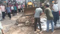 हवेली खड़गपुर में चला बुलडोजर, अतिक्रमण हटाने उतरा नगर प्रशासन, दुकानदारों में मचा हड़कंप