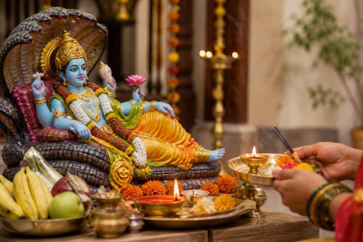 भगवान विष्णु की आरती करते हुए सांकेतिक तस्वीर (AI)
