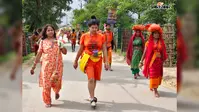 झमाझम बारिश में भी नहीं थमी कांवर यात्रा, बोलबम के जयघोष के साथ बाबाधाम की ओर बढ़ते रहे श्रद्धालु