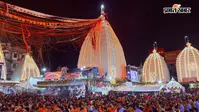 Photos: श्रावणी मेले के 15वें दिन बाबा मंदिर में जलार्पण के लिए उमड़ी कांवरियों की भारी भीड़, देखें तस्वीर