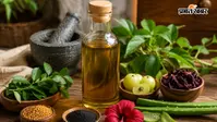बाल तेजी से झड़ रहे हैं? किचन में रखी इन चीजों से बनाएं Homemade हेयर ऑयल