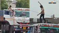 Video : चलती ट्रक के ऊपर चढ़कर थिरकने लगा ड्राइवर, खतरनाक स्टंट का वीडियो वायरल