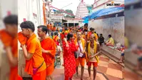 मूसलाधार बारिश भी नहीं डिगा सकी आस्था,बासुकिनाथ में 4 KM तक कांवरियों की कतार
