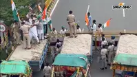 राजभवन मार्च को रोकने का पटना पुलिस का देसी जुगाड़, बैरिकेड के साथ सड़क पर खड़े कर दिए बालू लदे ट्रैक्टर