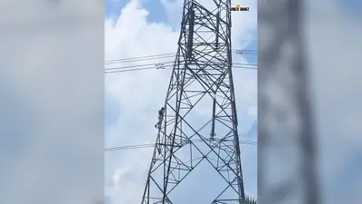 शराब के लिए पैसे नहीं मिले तो हाइटेंशन टावर पर चढ़ा युवक, पत्नी ने मनाकर उतारा