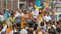 Photos : मसौढ़ी-धनरुआ में अनंत सिंह का रोड शो, जेसीबी से हुई फुलों की वर्षा, शहीद की प्रतिमा पर चढ़ाए फूल